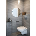 Instapklare tussenwoning met tuinkamer, visgraat PVC-vloer met vloerverwarming, moderne keuken en verzorgde afwerking aan de Vechterweerdstraat 60 in Stadshagen, Zwolle