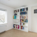 Woning Savornin Lohmanlaan 24 Zwolle, gelegen in Oud-Ittersum in Zwolle-Zuid, met diepe tuin en vrij uitzicht.