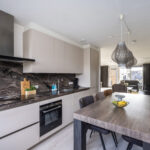 Woning Sterrenmos 62 in Zwolle, ruime tussenwoning met uitbouw en diepe tuin