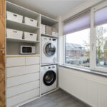 Instapklare tussenwoning met tuinkamer, visgraat PVC-vloer met vloerverwarming, moderne keuken en verzorgde afwerking aan de Vechterweerdstraat 60 in Stadshagen, Zwolle