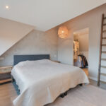 Instapklare tussenwoning met tuinkamer, visgraat PVC-vloer met vloerverwarming, moderne keuken en verzorgde afwerking aan de Vechterweerdstraat 60 in Stadshagen, Zwolle