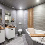 Instapklare tussenwoning met tuinkamer, visgraat PVC-vloer met vloerverwarming, moderne keuken en verzorgde afwerking aan de Vechterweerdstraat 60 in Stadshagen, Zwolle